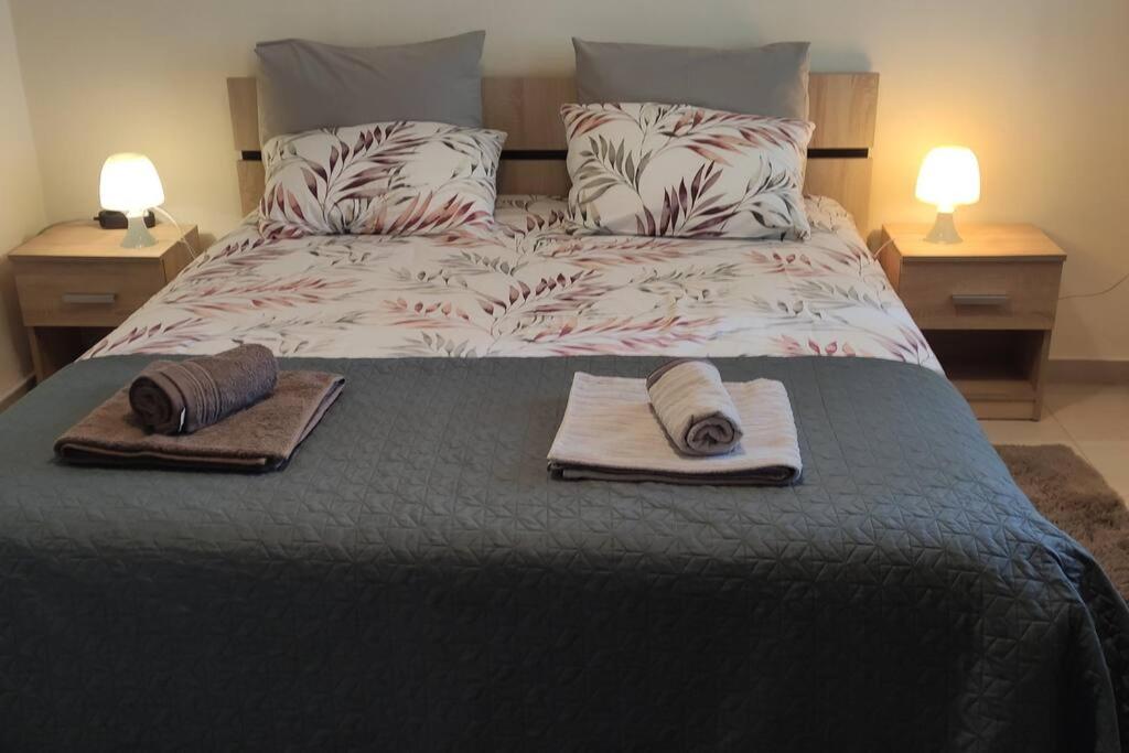 Postel nebo postele na pokoji v ubytování Άνετη διαμονή στο κέντρο της Ανατολής