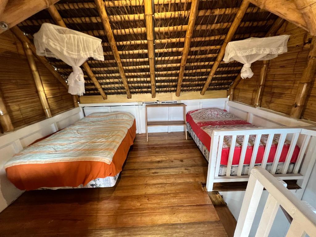 Postel nebo postele na pokoji v ubytování Zutalu - Playa Sur