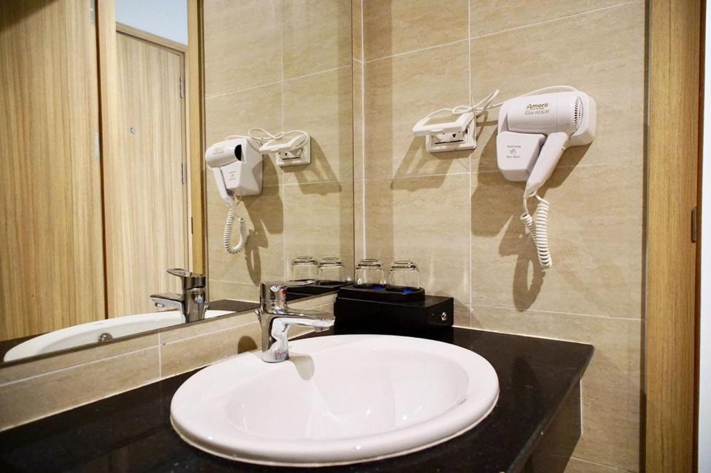 Phòng tắm tại Amorii Hotel
