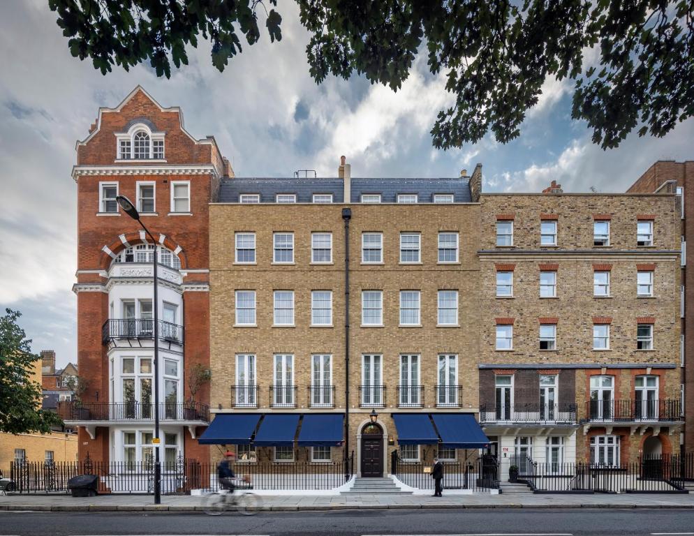 a large brick building on a city street at Beaverbrook Town House in London