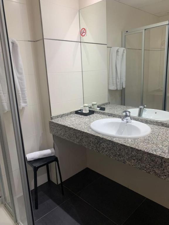 Koupelna v ubytování Hospedium Hotel Continental