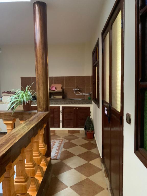 Kuchyň nebo kuchyňský kout v ubytování House Naïma