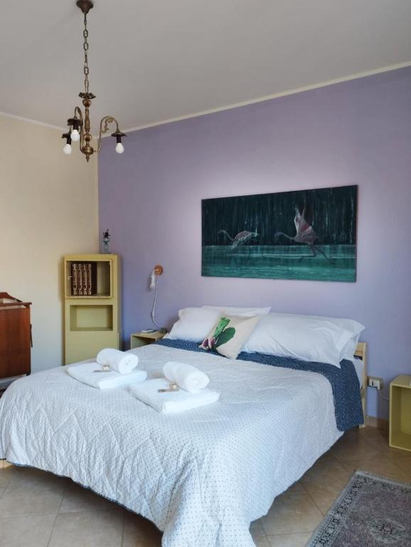 Postel nebo postele na pokoji v ubytování Ferula loft
