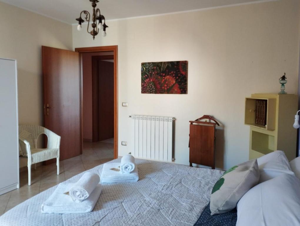 Postel nebo postele na pokoji v ubytování Ferula loft