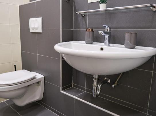 Koupelna v ubytování Strand Apartman