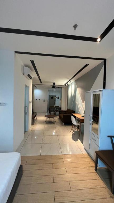 Postel nebo postele na pokoji v ubytování ITCC Manhattan Suites by PRIME