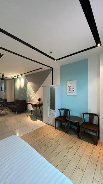 Postel nebo postele na pokoji v ubytování ITCC Manhattan Suites by PRIME