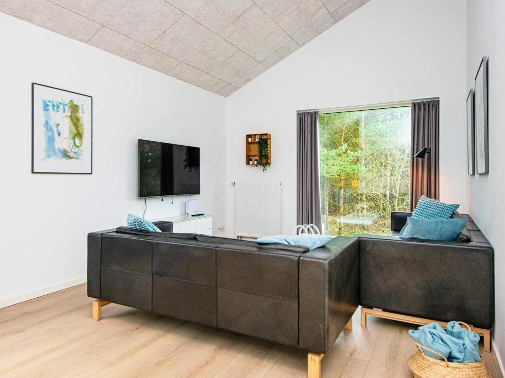 TV a/nebo společenská místnost v ubytování Luxury Retreat with Sauna - By Traum Ferienwohnungen