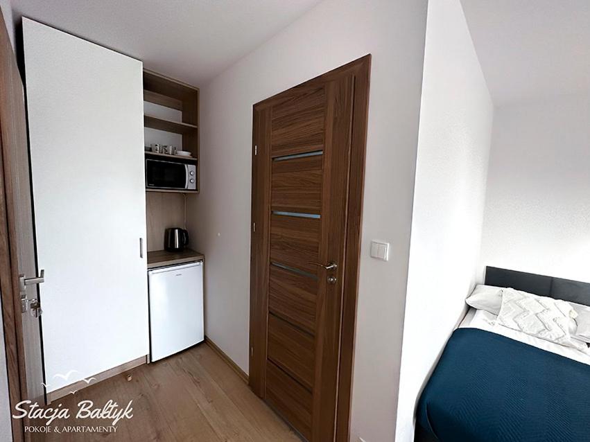 Postel nebo postele na pokoji v ubytování Stacja Bałtyk