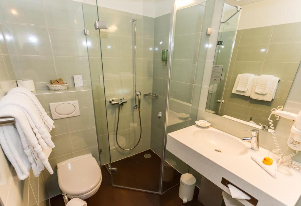 Koupelna v ubytování Sorell Hotel Ador