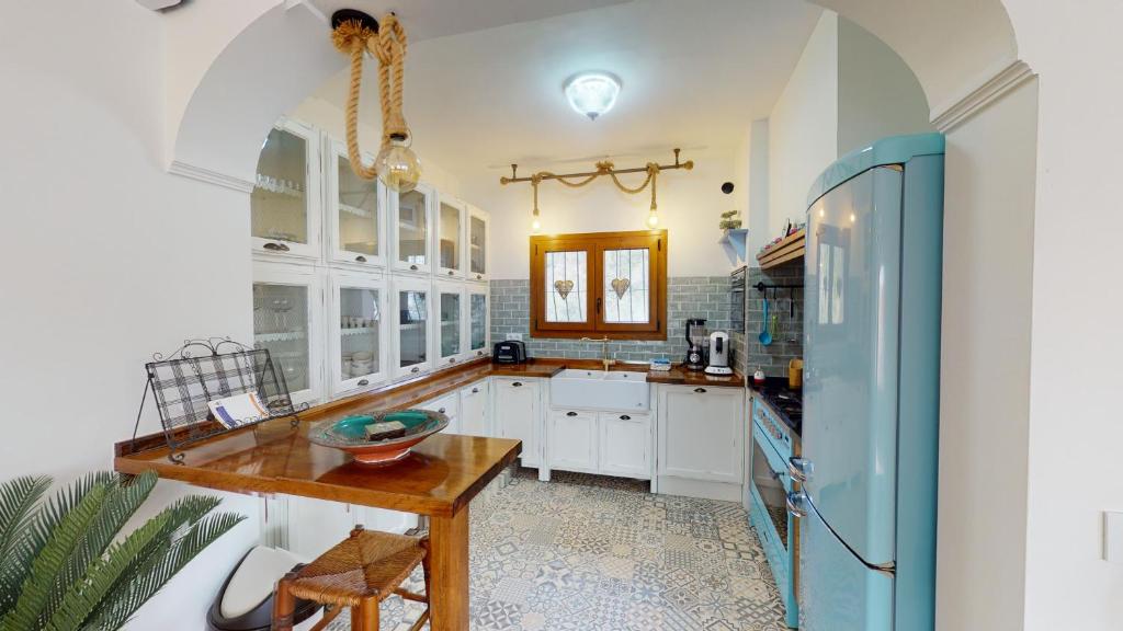 Kuchyň nebo kuchyňský kout v ubytování Villa Encinas