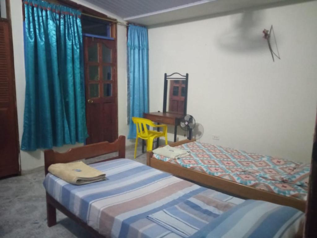 Katil atau katil-katil dalam bilik di Casa de los Cruz