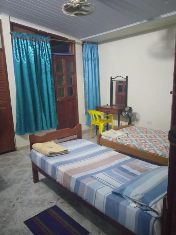 Katil atau katil-katil dalam bilik di Casa de los Cruz