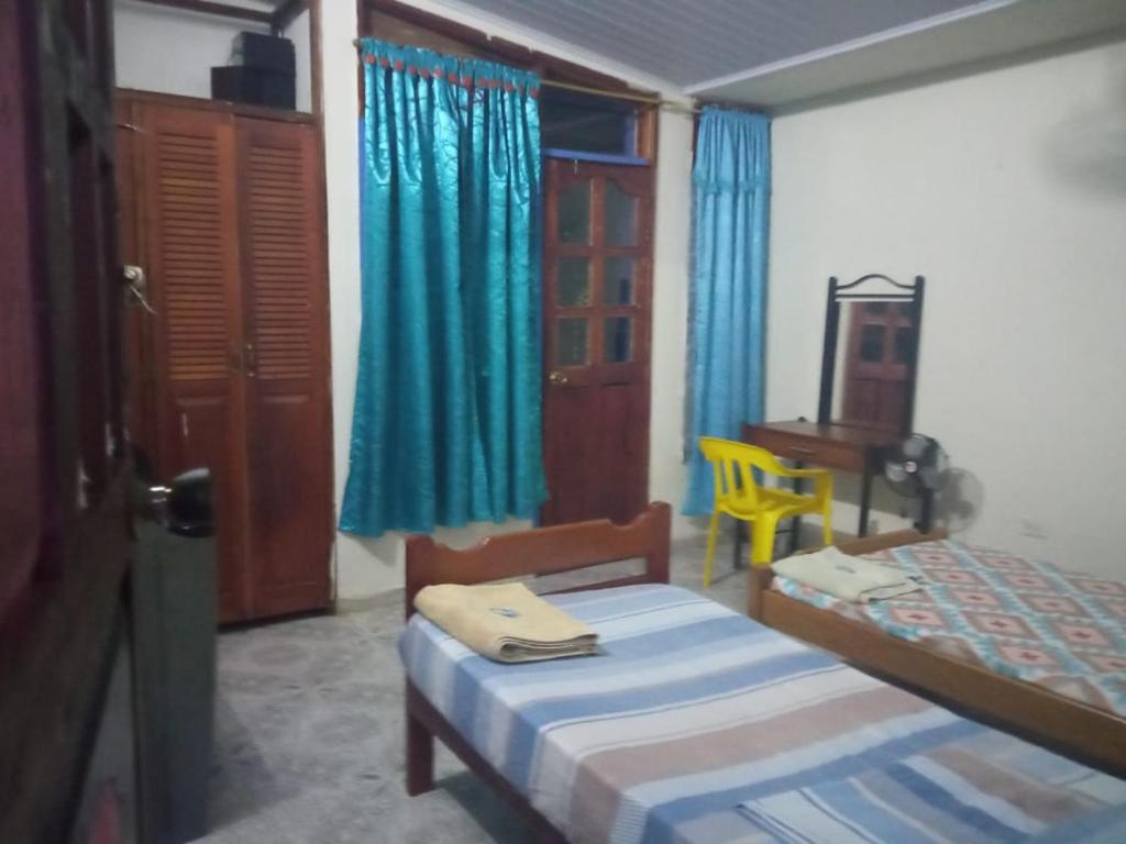 Katil atau katil-katil dalam bilik di Casa de los Cruz