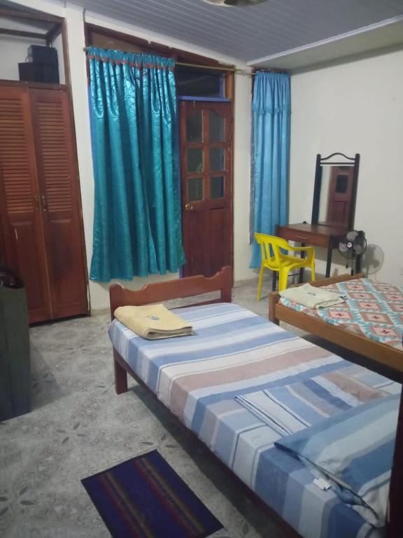 Katil atau katil-katil dalam bilik di Casa de los Cruz