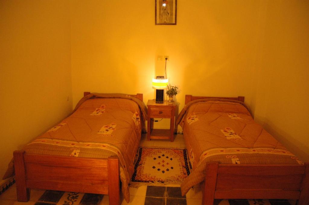 Letto o letti in una camera di Riad Freija-TAROUDANT