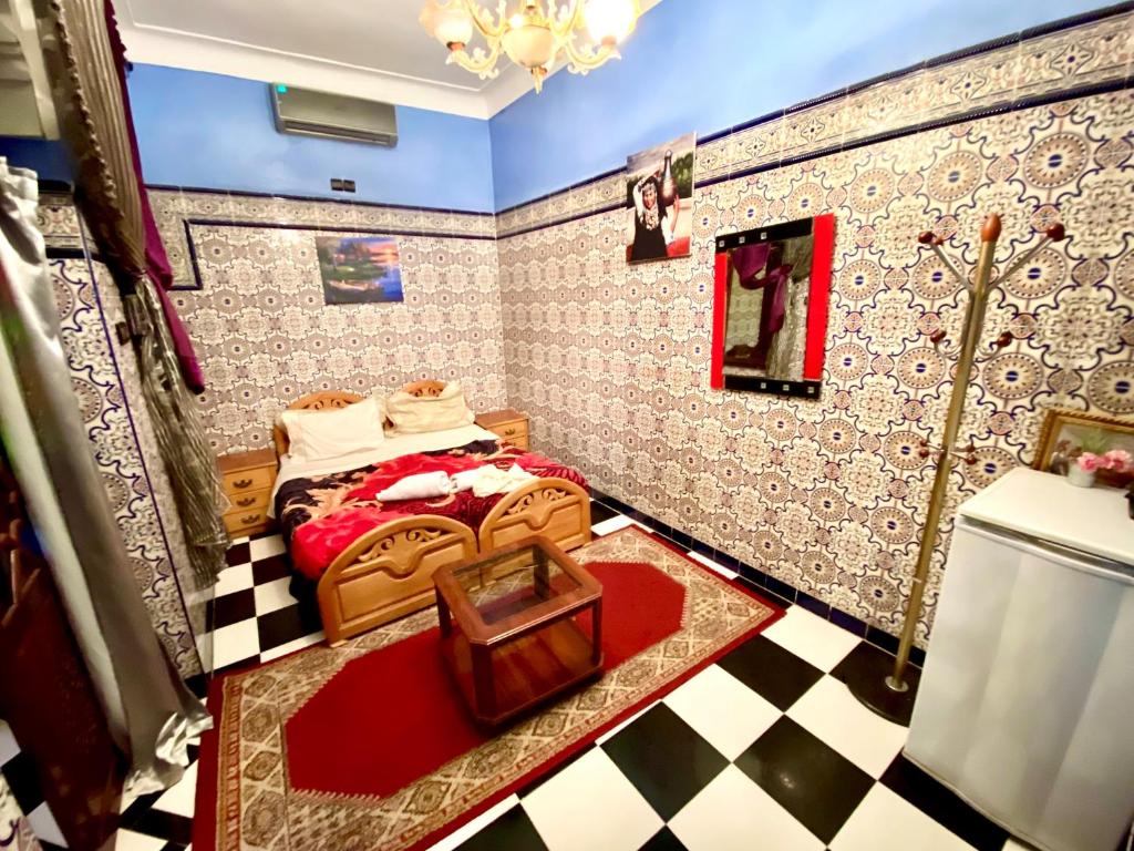 Postel nebo postele na pokoji v ubytování Riad Fattouma Kasba