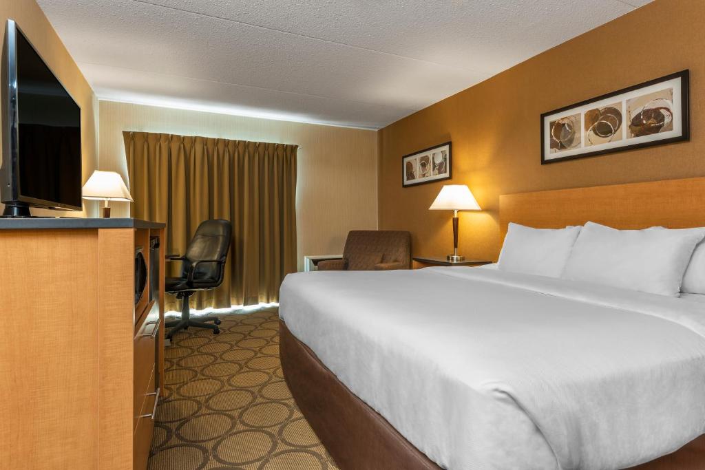 Postel nebo postele na pokoji v ubytování Comfort Inn