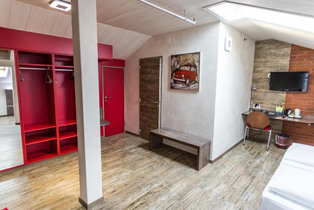 Televízia a/alebo spoločenská miestnosť v ubytovaní Sorell Hotel Arabelle