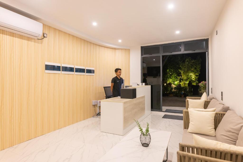 TV a/nebo společenská místnost v ubytování Atoll Residence Dhangethi