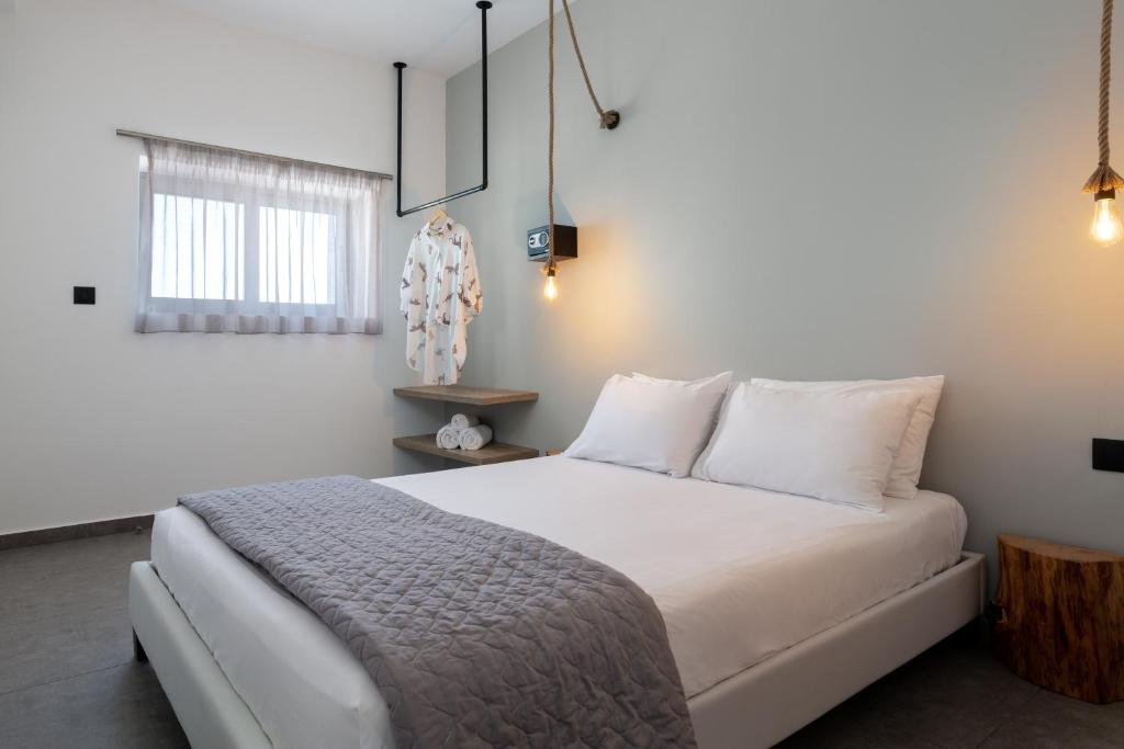 Postel nebo postele na pokoji v ubytování Southrock Villas