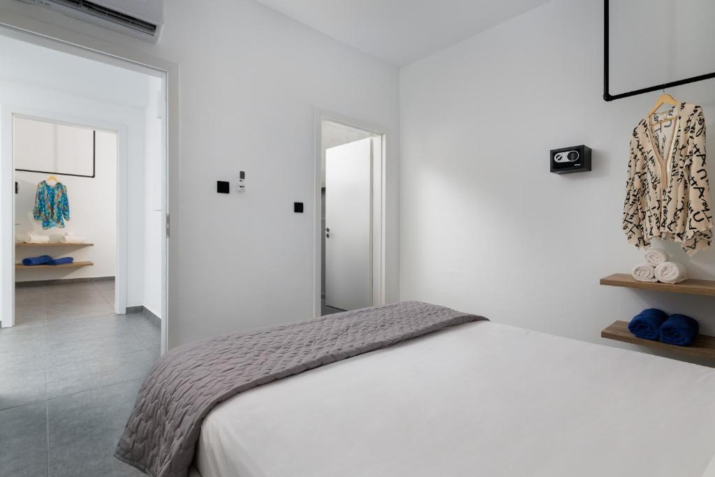 Postel nebo postele na pokoji v ubytování Southrock Villas