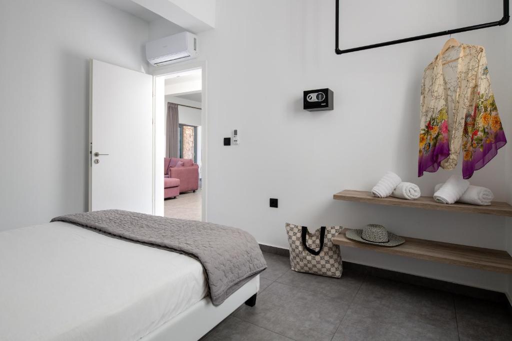 Postel nebo postele na pokoji v ubytování Southrock Villas