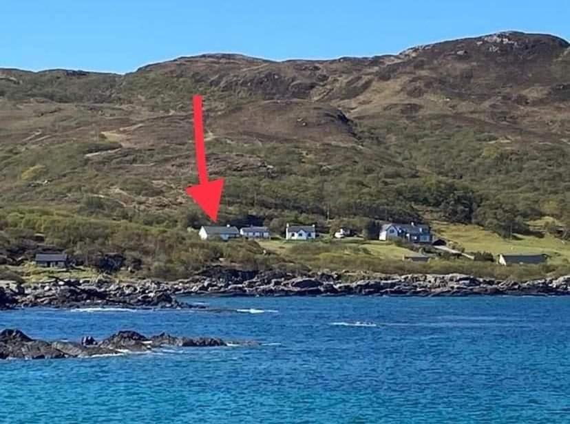 an island in the ocean with a red arrow at Borve House, Kilchoan in Kilchoan