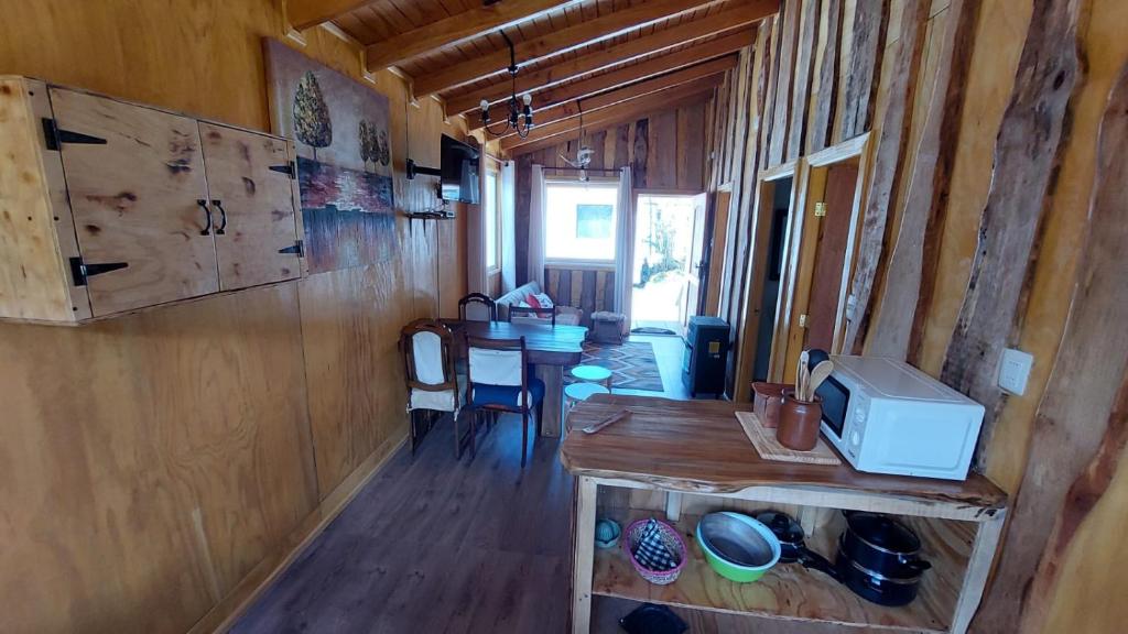 Kuchyň nebo kuchyňský kout v ubytování Cabañas & Habitaciones Del Alto
