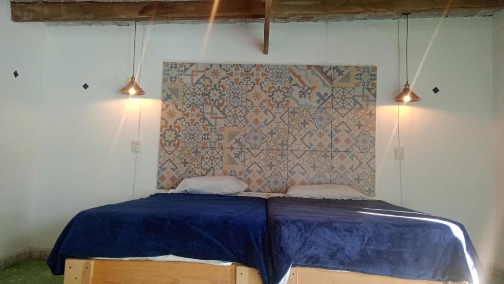 Postel nebo postele na pokoji v ubytování PATIO Alojamiento