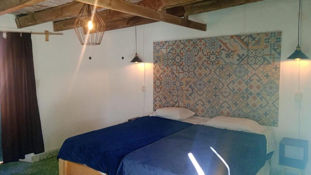 Postel nebo postele na pokoji v ubytování PATIO Alojamiento