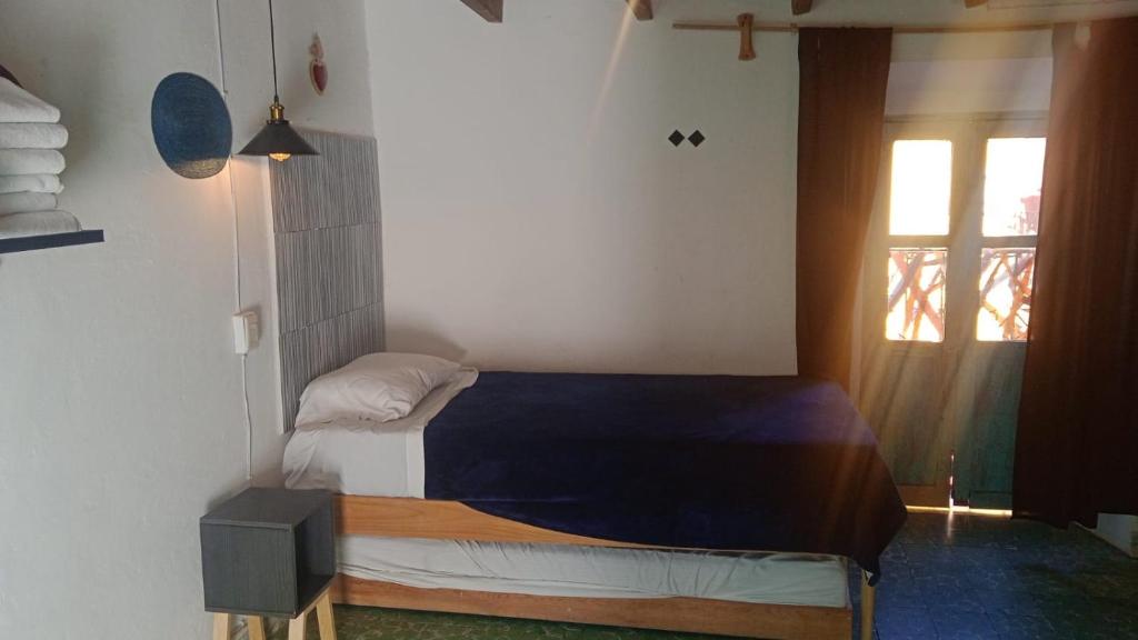 Postel nebo postele na pokoji v ubytování PATIO Alojamiento