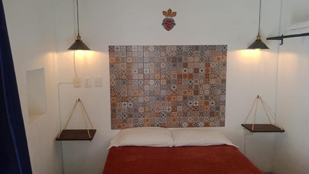 Postel nebo postele na pokoji v ubytování PATIO Alojamiento