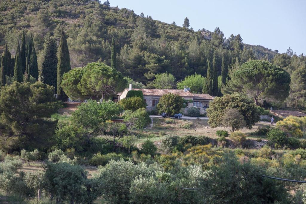 a house in the middle of a mountain at Mas de Baubesse: Paradise in Provence in Les Baux-de-Provence