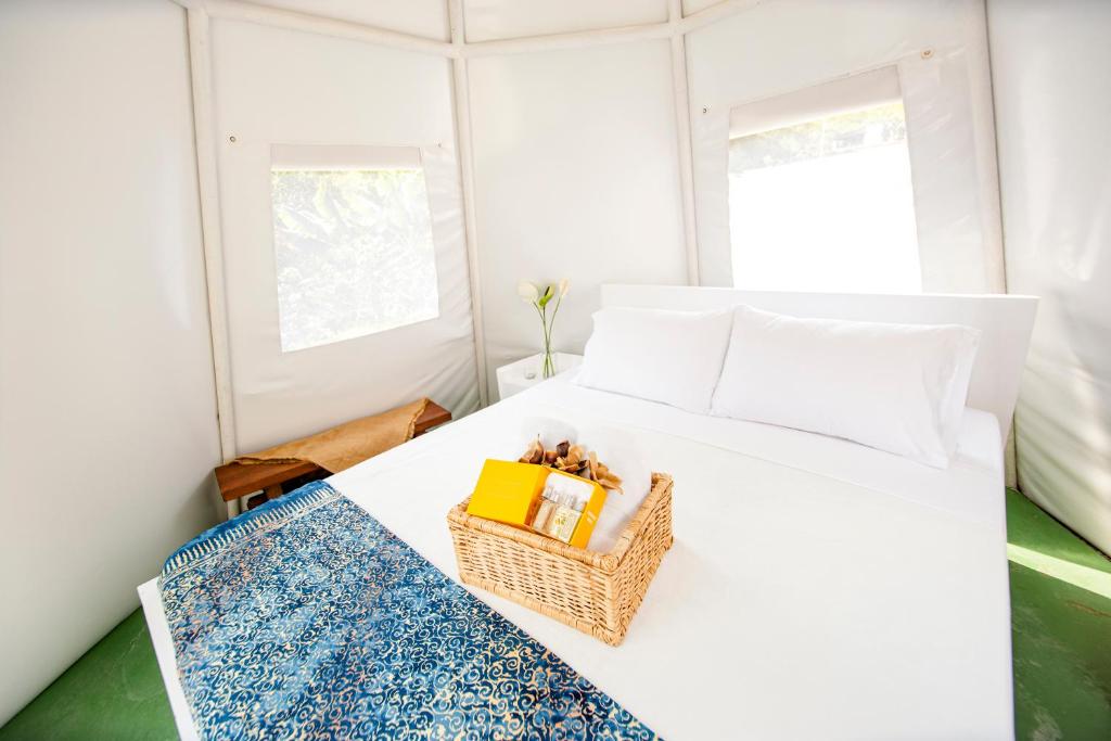 Postel nebo postele na pokoji v ubytování Cerro Tusa Glamping