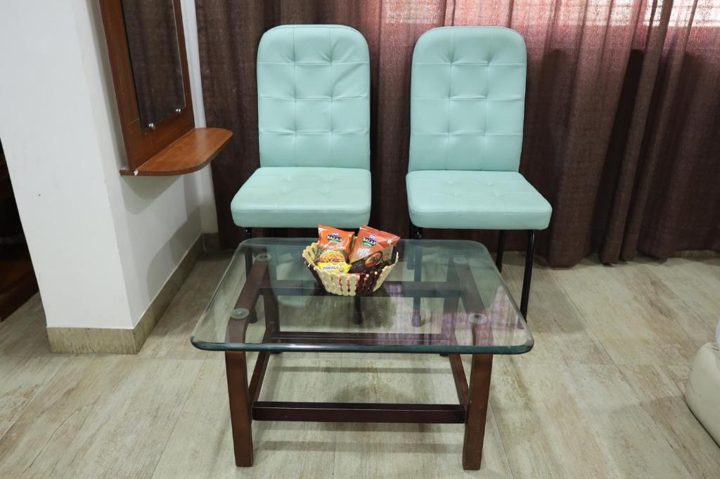 Posezení v ubytování Saish Hotel Shirdi