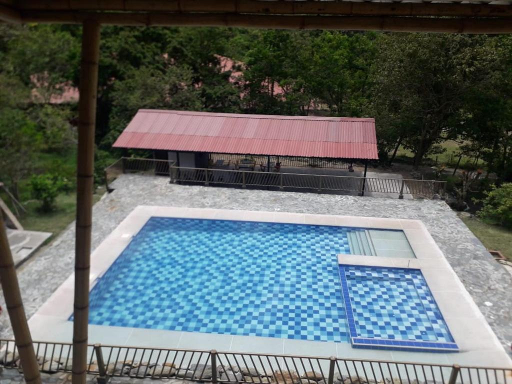 Bazén v ubytování El Guadual Casa Campestre nebo v jeho okolí