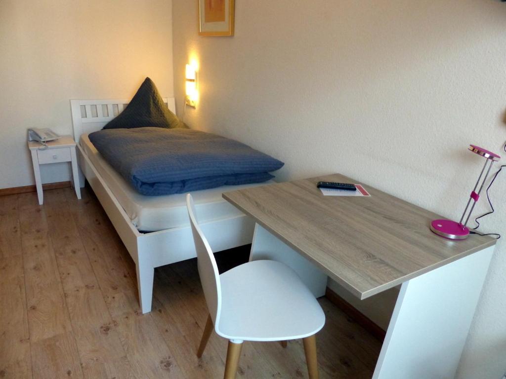 Postel nebo postele na pokoji v ubytování Hotel Theile garni
