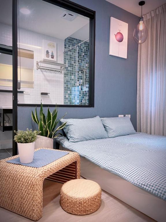Postel nebo postele na pokoji v ubytování 定春行旅 Haru Guesthouse