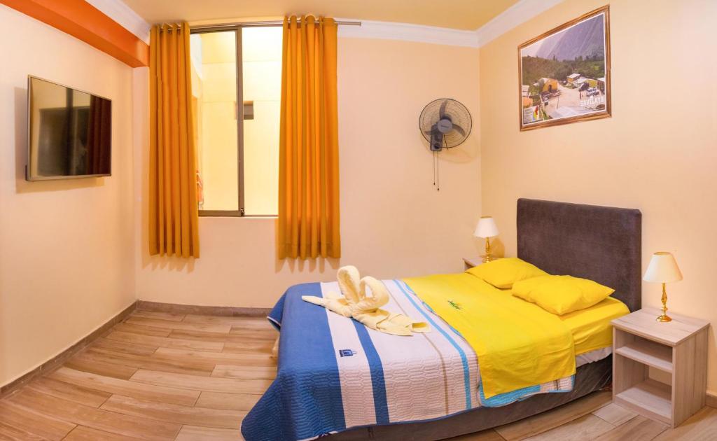 Postel nebo postele na pokoji v ubytování Hotel Savilayo
