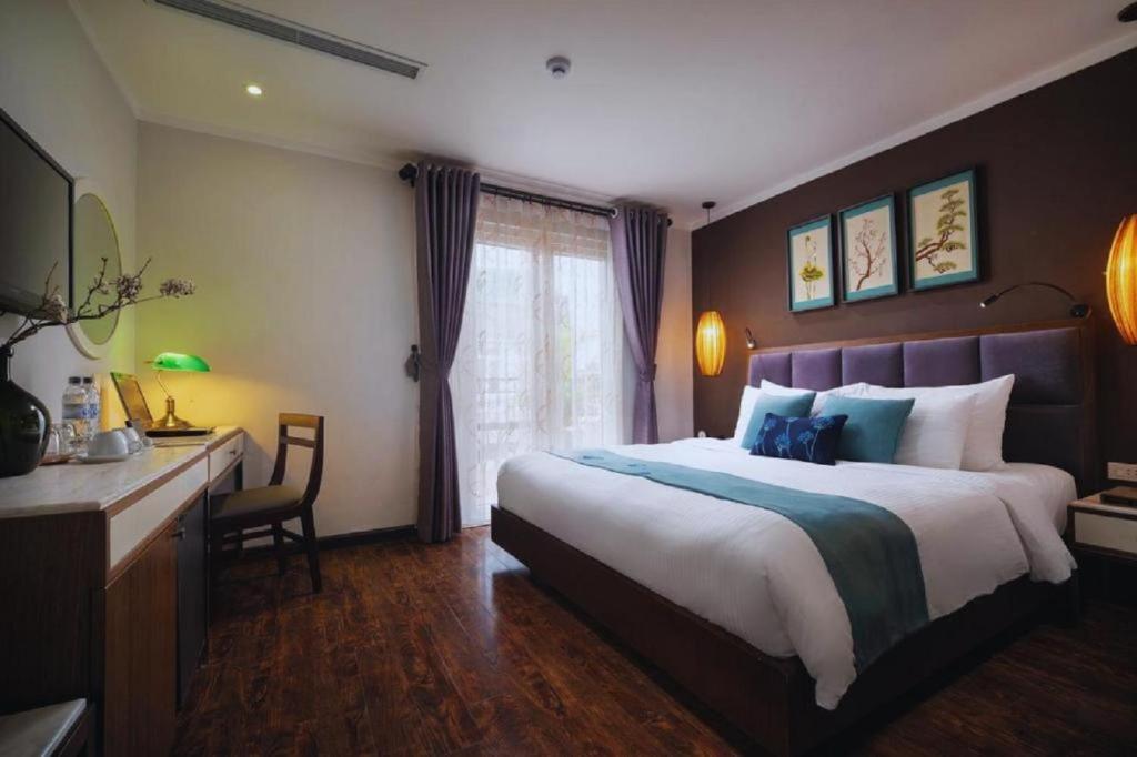 Postel nebo postele na pokoji v ubytování Hotel Emerald Waters Classy