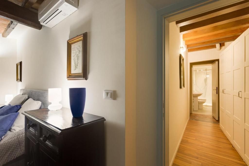Posteľ alebo postele v izbe v ubytovaní Apartments Florence - Vigna Nuova Alberti