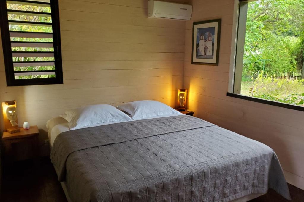 Vuode tai vuoteita majoituspaikassa Cottage Miti Reva