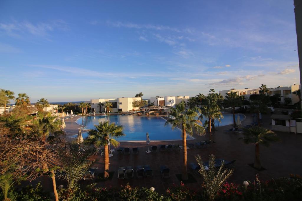Bazén v ubytování Sharm Reef Hotel nebo v jeho okolí