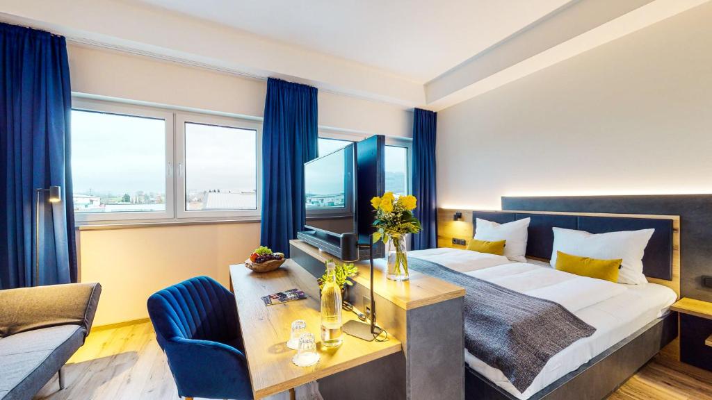 Postel nebo postele na pokoji v ubytování Point 7 Hotel