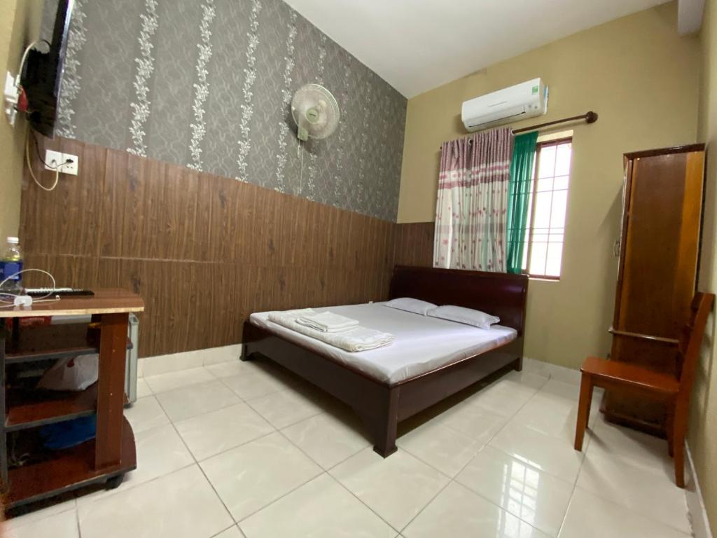 Postel nebo postele na pokoji v ubytování Thu Đô Motel