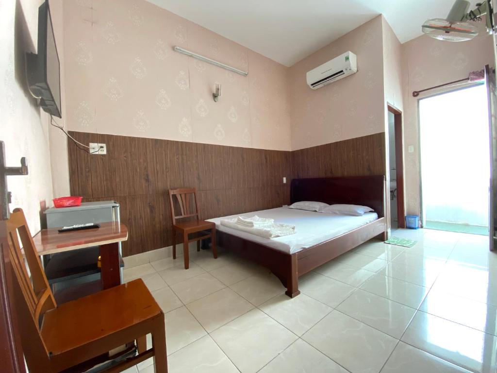 Postel nebo postele na pokoji v ubytování Thu Đô Motel