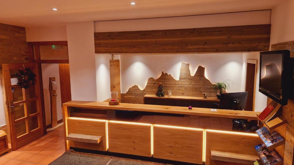 TV a/nebo společenská místnost v ubytování Sporthotel Dachstein West