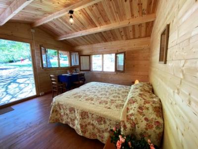 Postel nebo postele na pokoji v ubytování Camping Camaldoli
