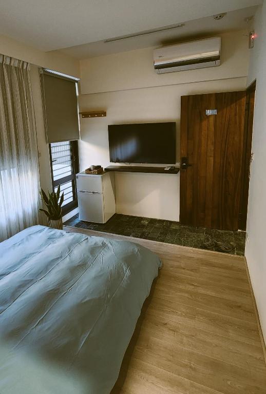 TV a/nebo společenská místnost v ubytování 定春行旅 Haru Guesthouse